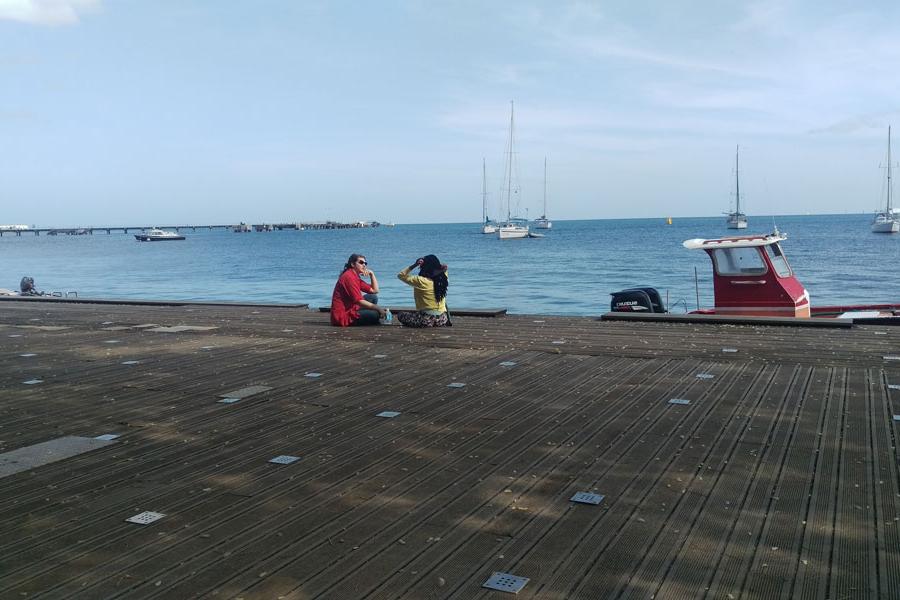 Two Agnes Scott study abroad students chatting in Martinique in 2018.