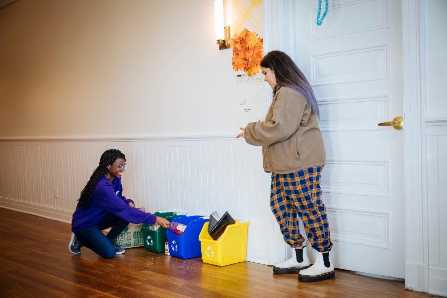 Agnes Scott students recycling. 